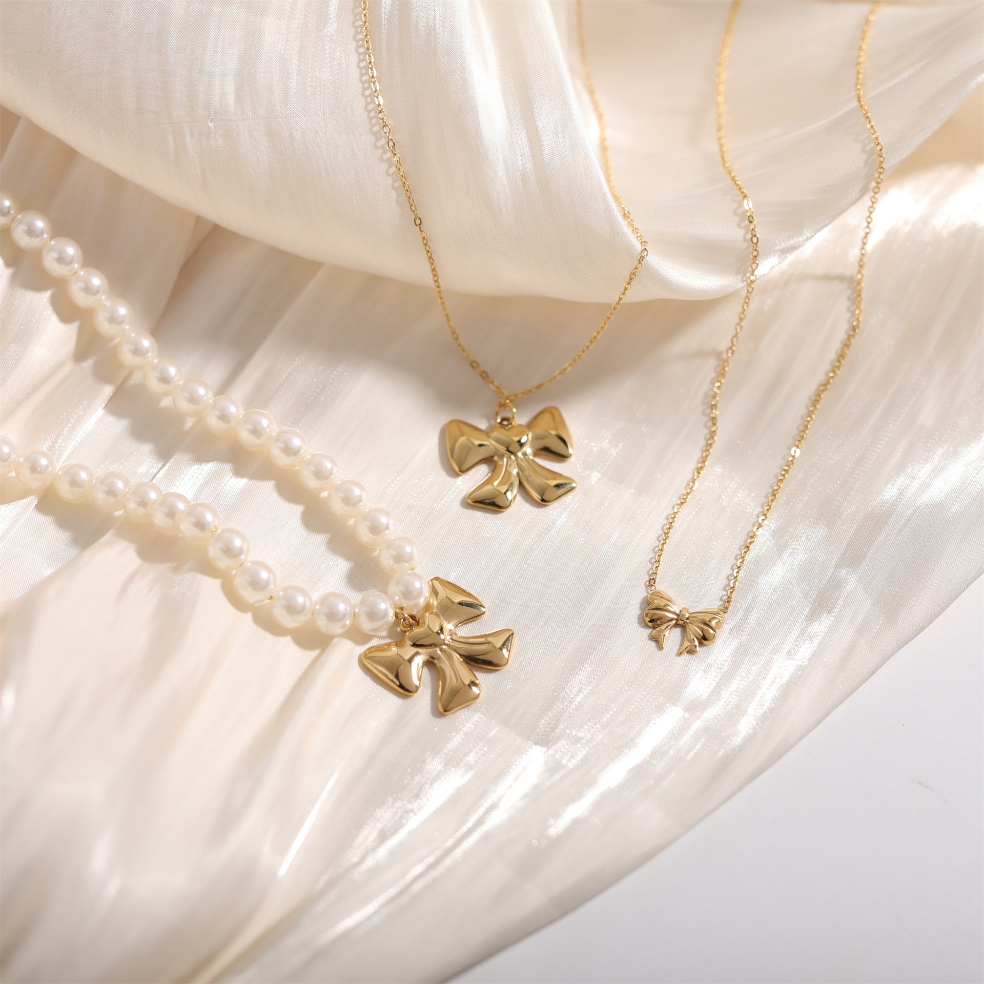 Gold Tiny Bow Necklace